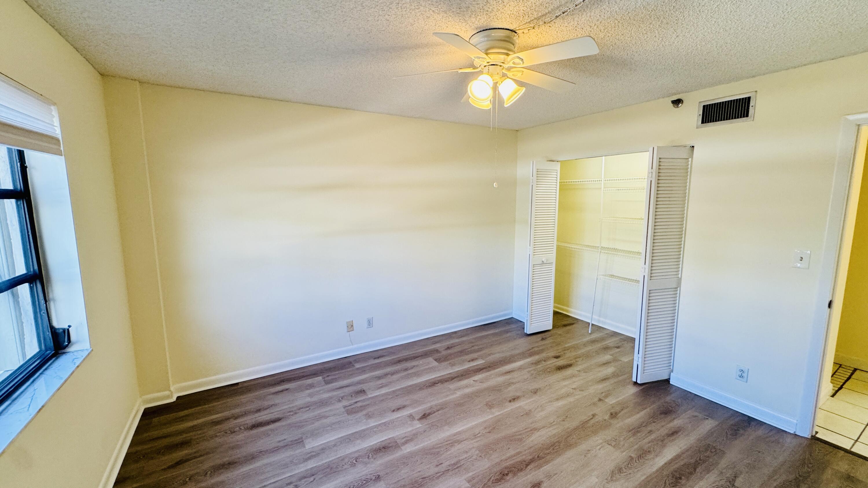 7030 Half Moon Circle, Unit 121 Hypoluxo, FL 33462 - Photo 49 of 74 Second bedroom