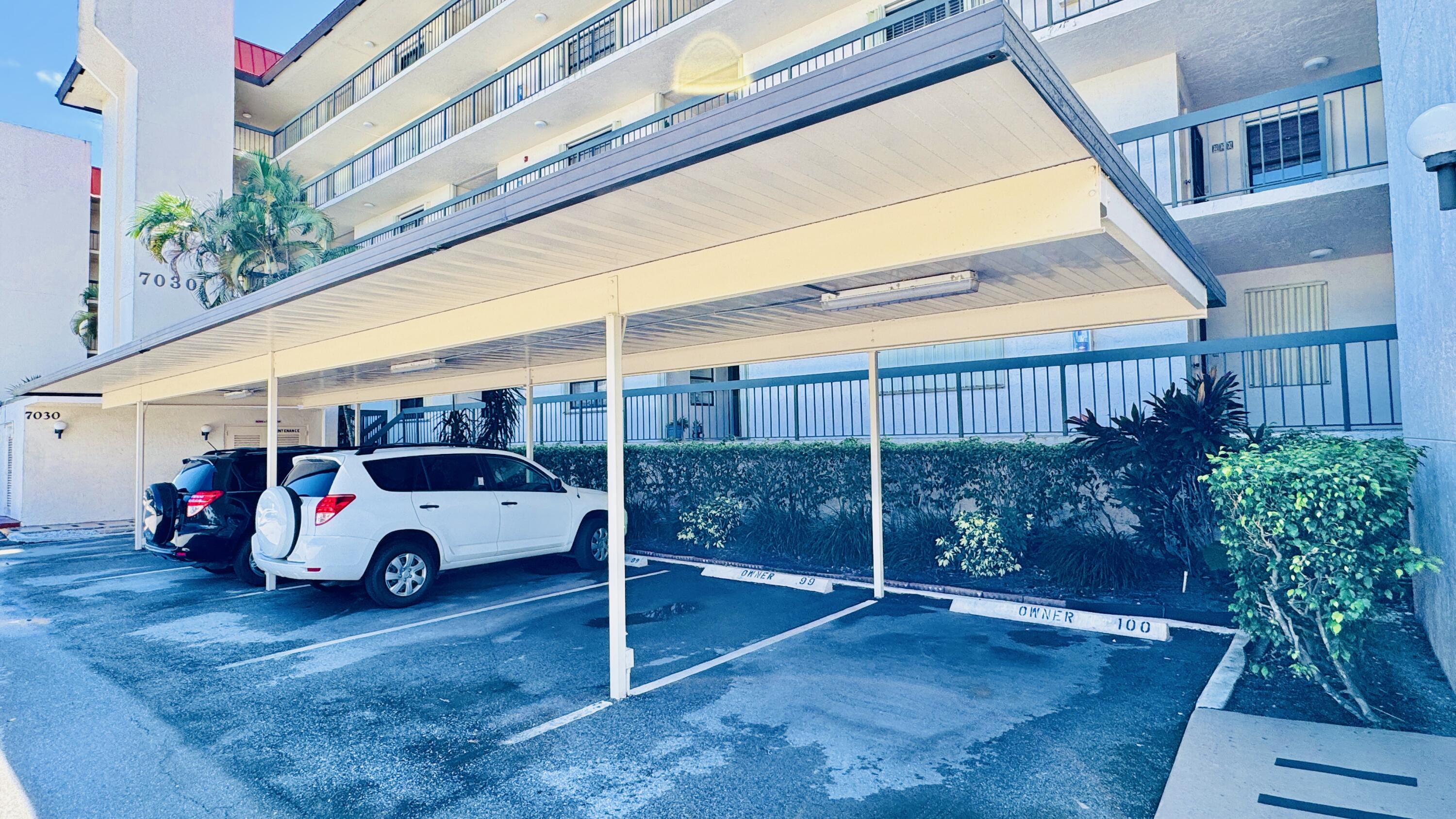 7030 Half Moon Circle, Unit 121 Hypoluxo, FL 33462 - Photo 72 of 74 Covered Parking