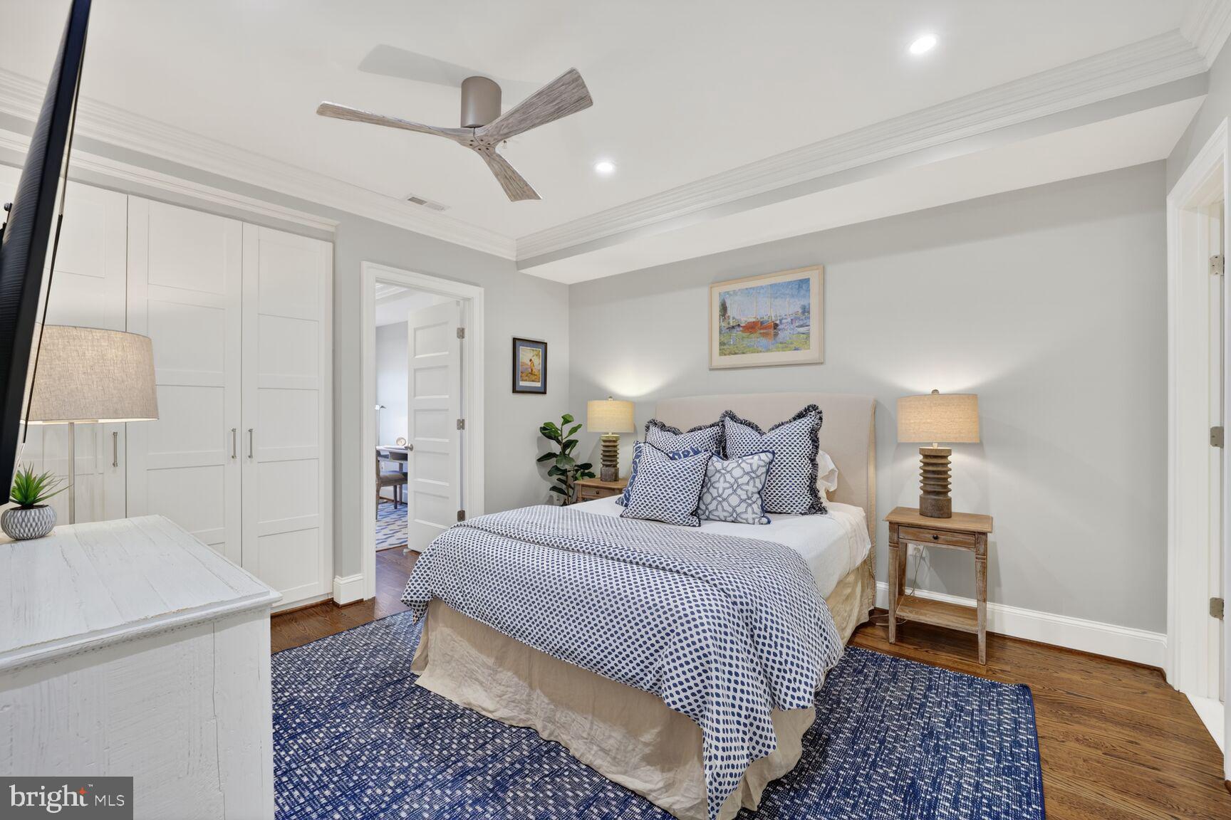 2446 Ontario Road Northwest, Unit 4 Washington, DC 20009 - Photo 13 of 65 a bedroom with a bed and a night stand