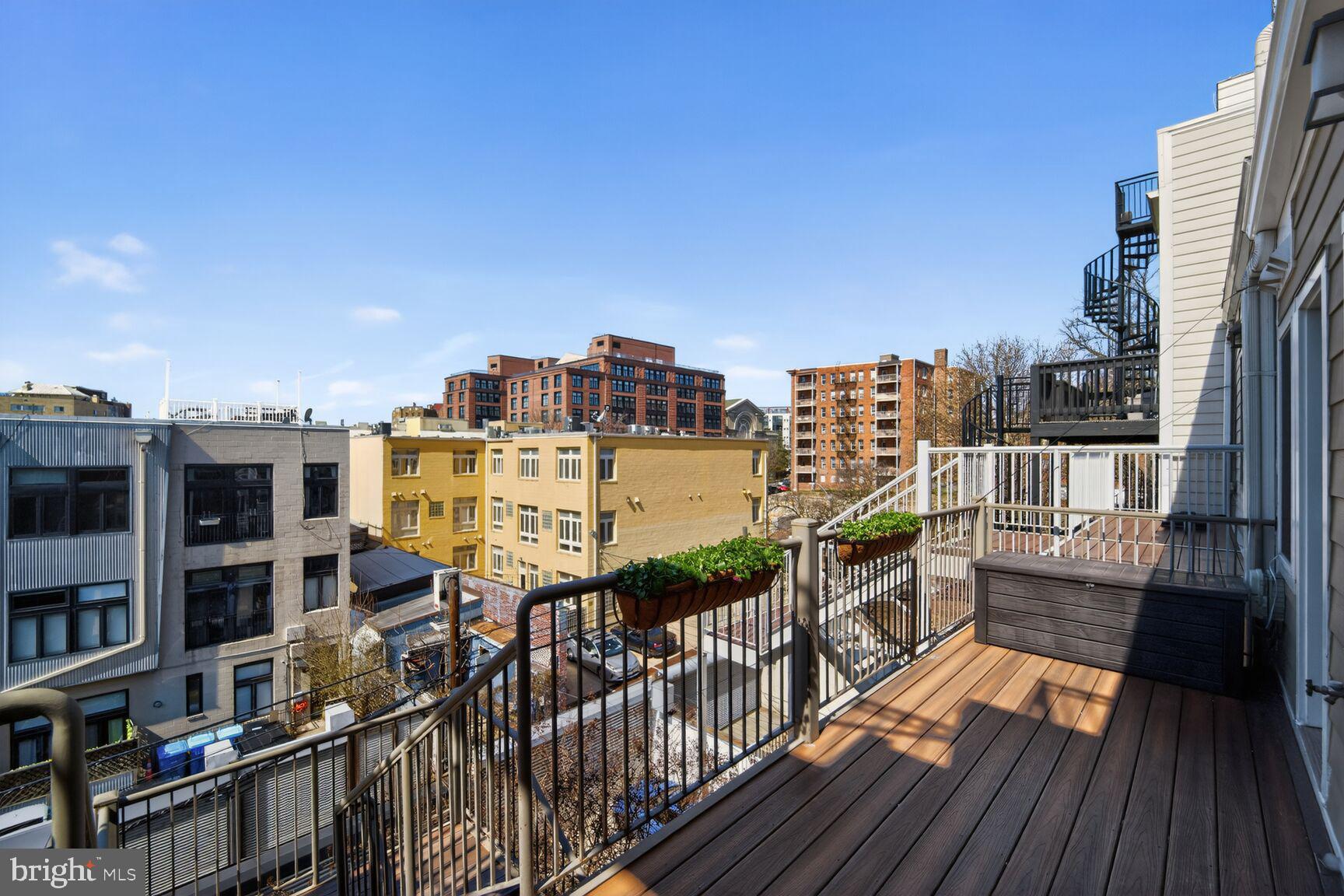 2446 Ontario Road Northwest, Unit 4 Washington, DC 20009 - Photo 23 of 65 a view of balcony with city view