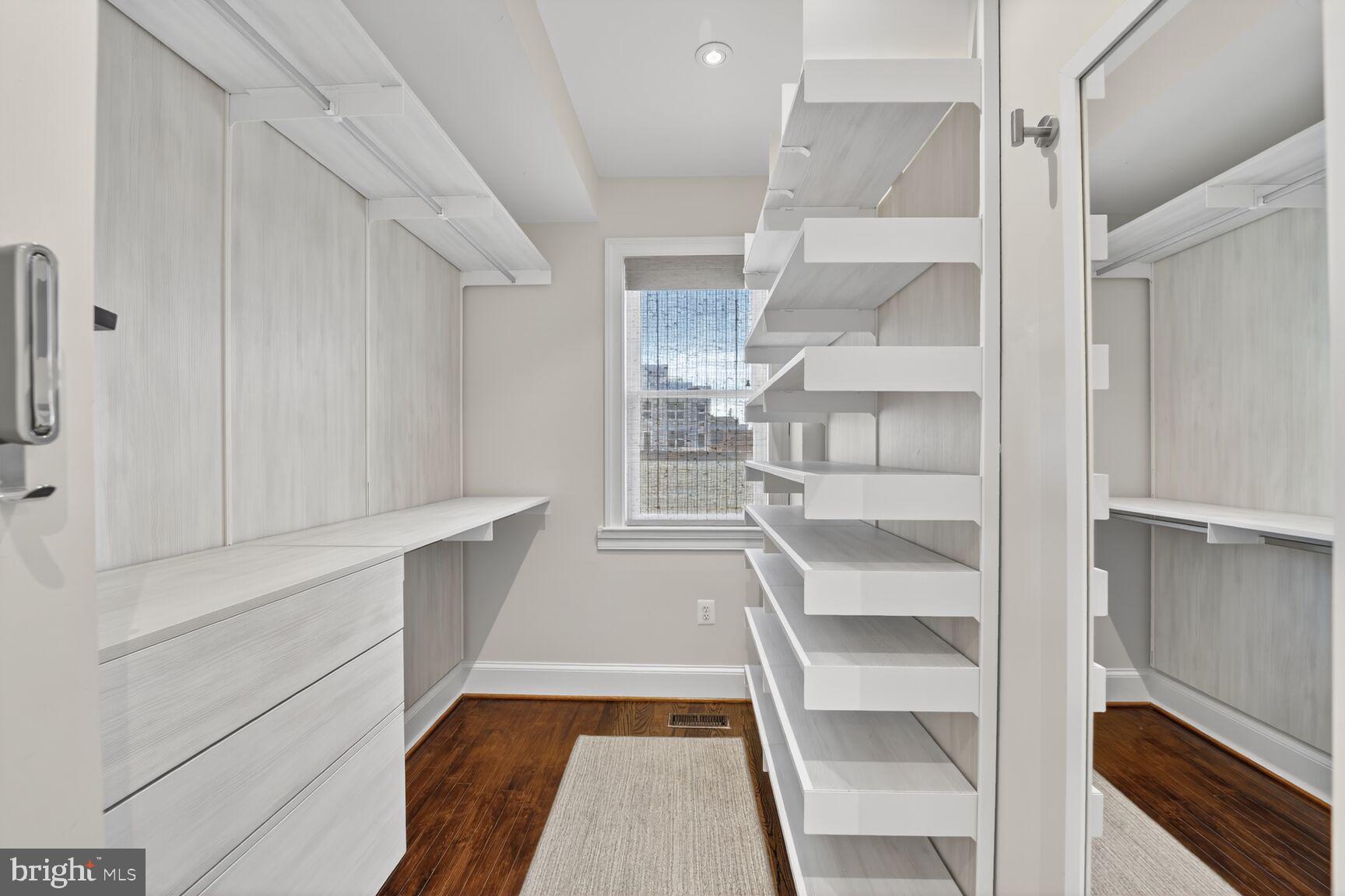 2446 Ontario Road Northwest, Unit 4 Washington, DC 20009 - Photo 27 of 65 a view of walk in closet with empty racks