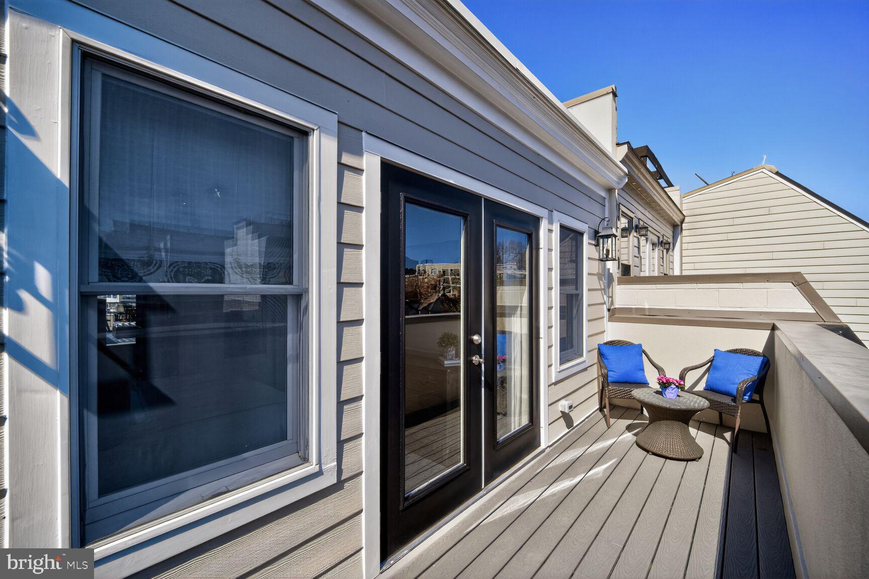 2446 Ontario Road Northwest, Unit 4 Washington, DC 20009 - Photo 32 of 65 a view of a balcony with furniture