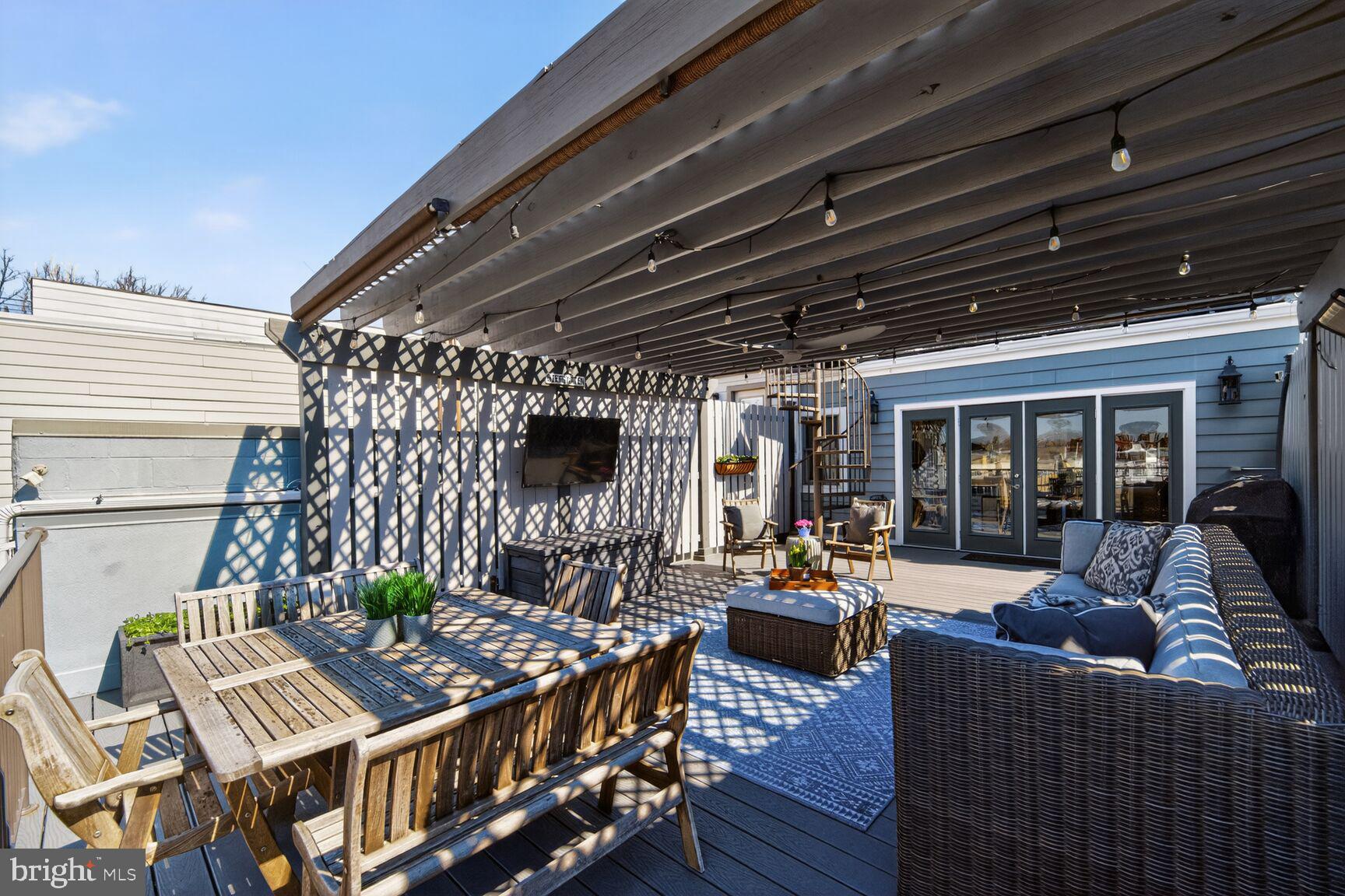 2446 Ontario Road Northwest, Unit 4 Washington, DC 20009 - Photo 37 of 65 a outdoor living space with furniture and garden view