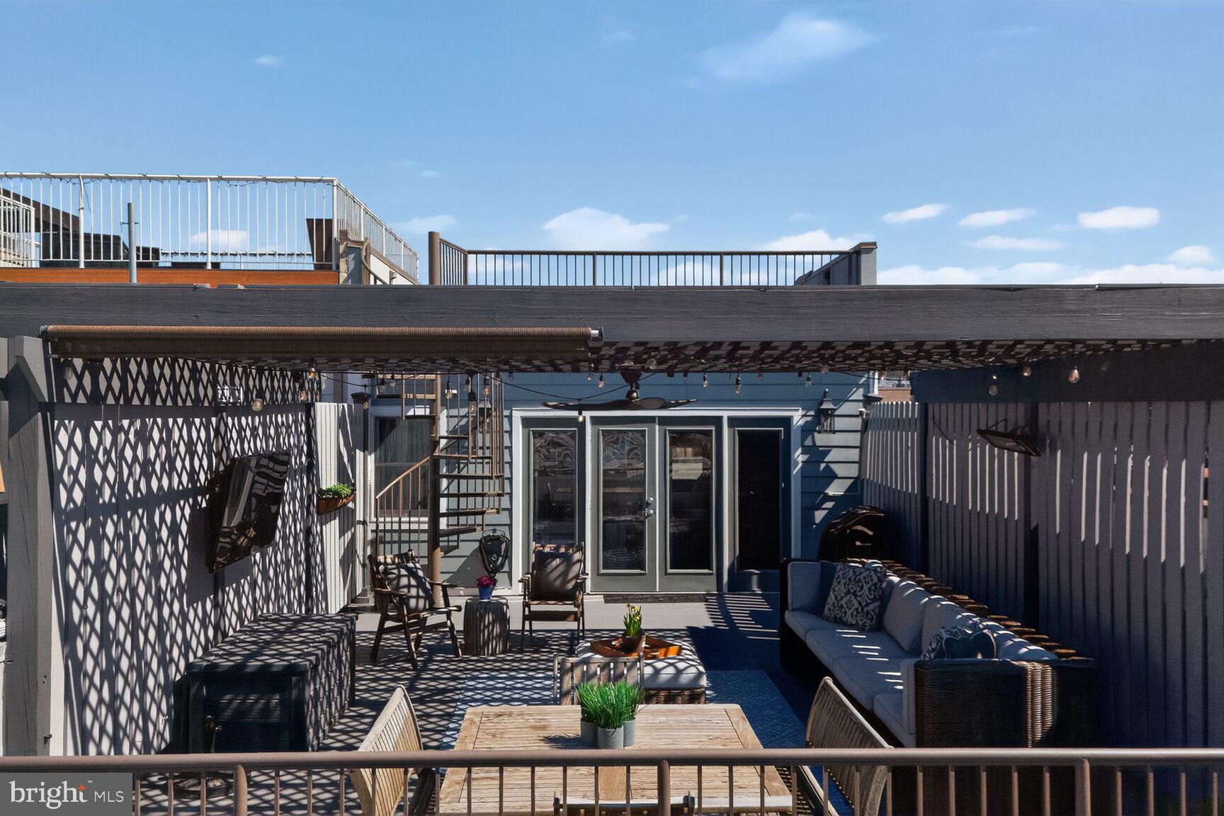 2446 Ontario Road Northwest, Unit 4 Washington, DC 20009 - Photo 38 of 65 French Doors Off Second Level Open to Lower Deck
