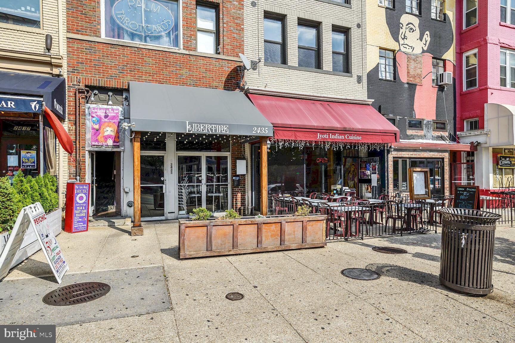 2446 Ontario Road Northwest, Unit 4 Washington, DC 20009 - Photo 57 of 65 a view of a building with sitting area