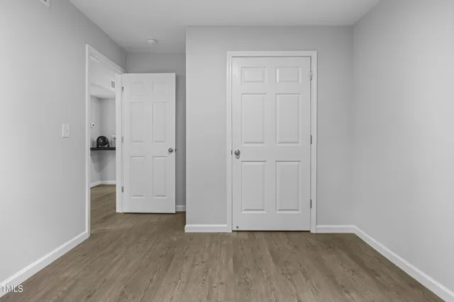a bathroom with a sink toilet a mirror and shower