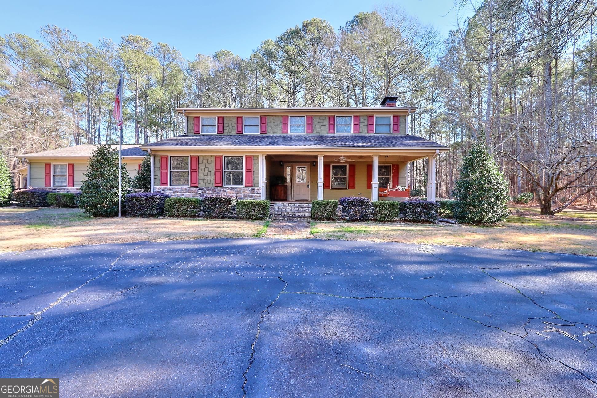 763 Old Forrester Road Monroe, GA 30655 - Photo 1 of 1 a front view of a house with yard and green space