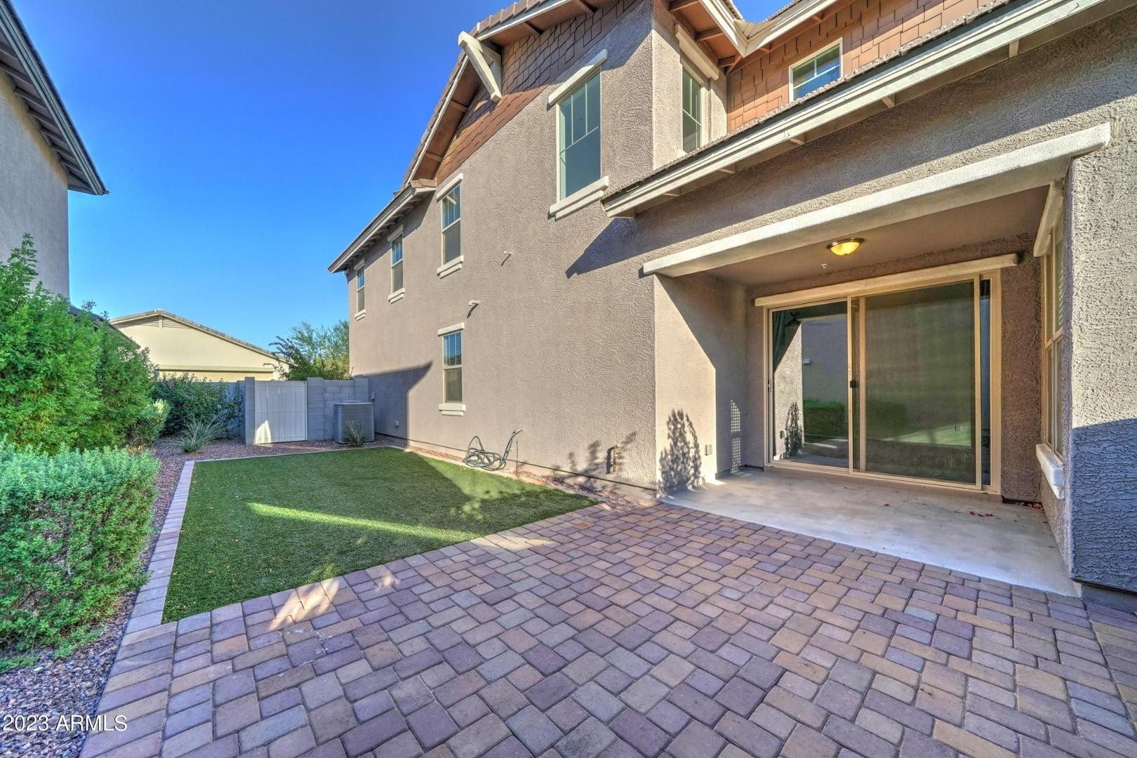 2297 North Alsap Road Buckeye, AZ 85396 - Photo 29 of 36 a view of a house with a yard