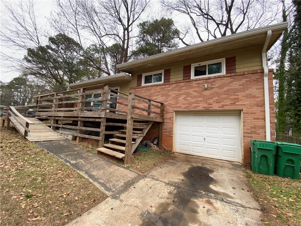 3024 Monterey Drive Decatur, GA 30032 - Photo 1 of 1 a front view of a house with a yard