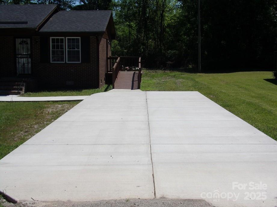 556 Roundtree Circle Chester, SC 29706 - Photo 2 of 15 a front view of a house with a yard