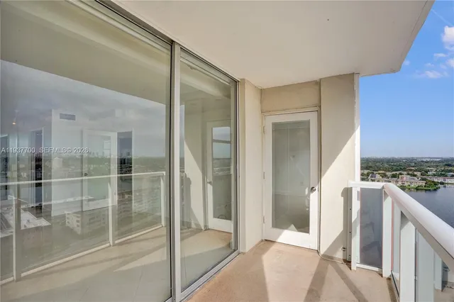 a bathroom with a tub and shower