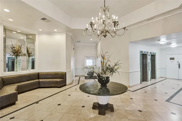 a view of a livingroom with furniture and window