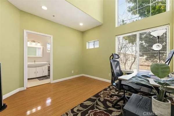 a workspace with furniture and window