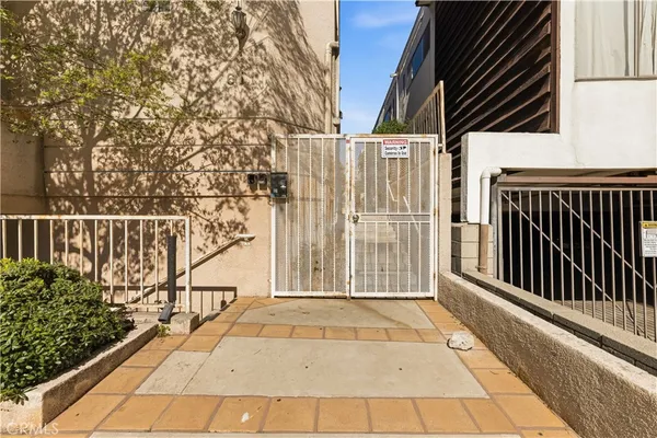 a view of a pathway of a house with wooden floor