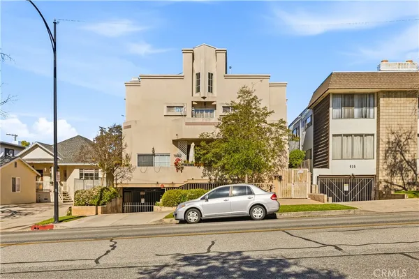 a car parked in front of a building