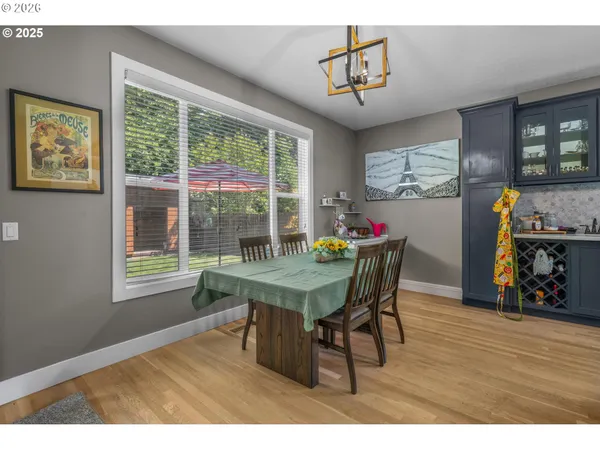 a view of a dining room with furniture window and outside view