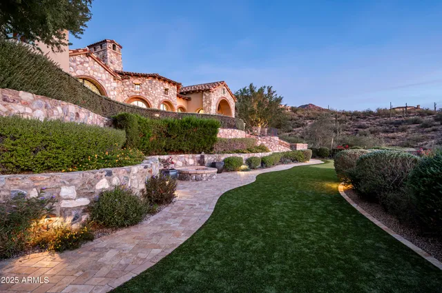 a view of a balcony with chairs
