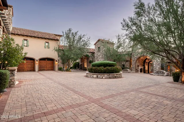 a view of a yard with cars