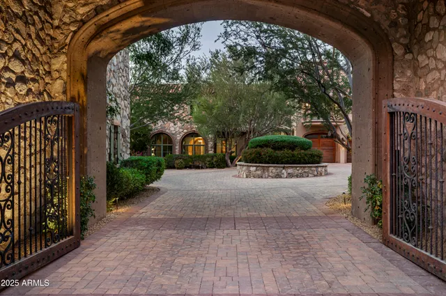a view of a entrance gate of a house