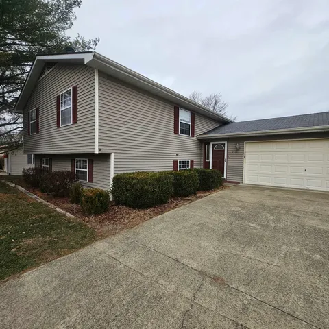 a front view of house with yard