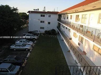 a view of a balcony with many windows