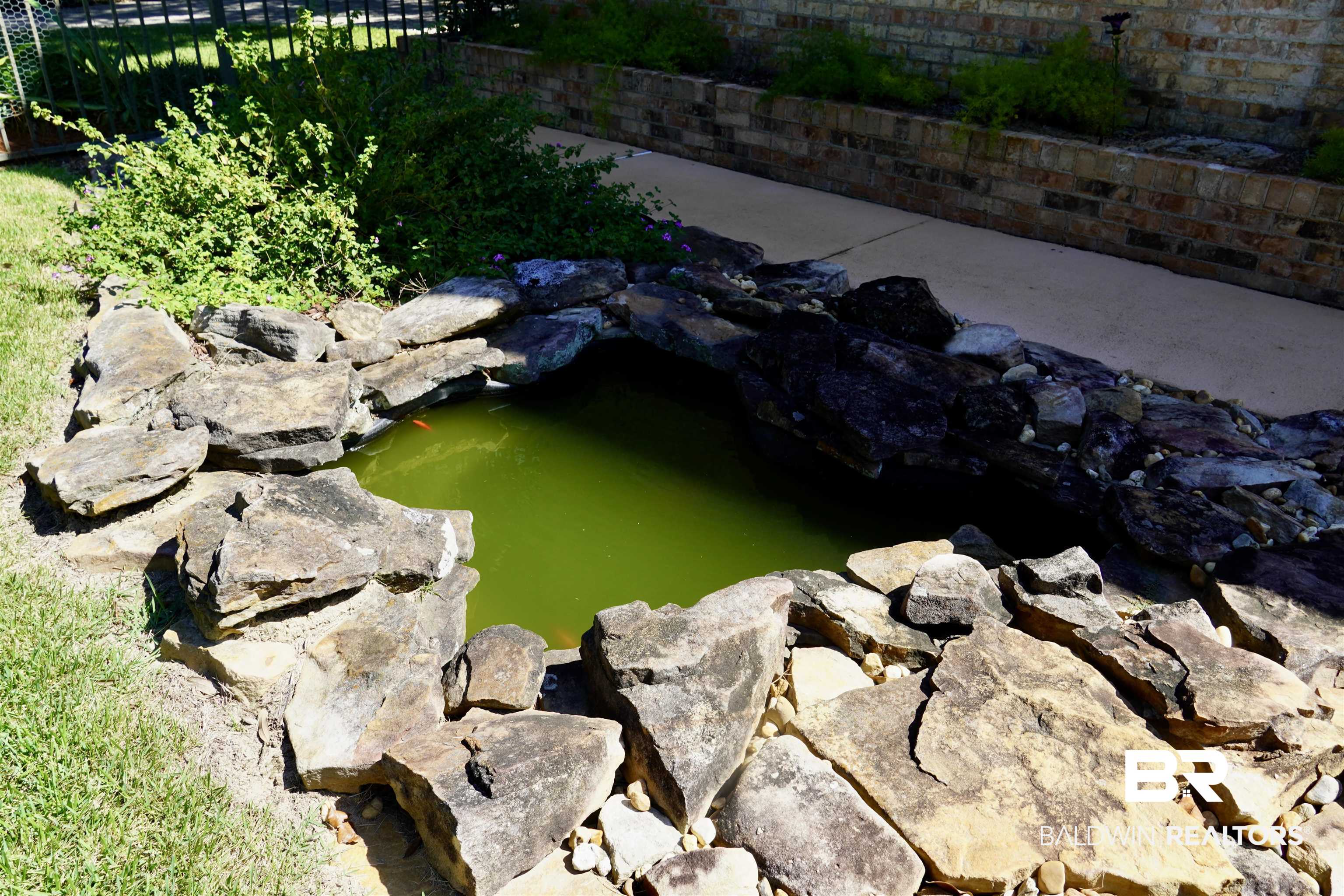 117 Belle Meade Brewton, AL 36426 - Photo 39 of 62 Details featuring a garden pond