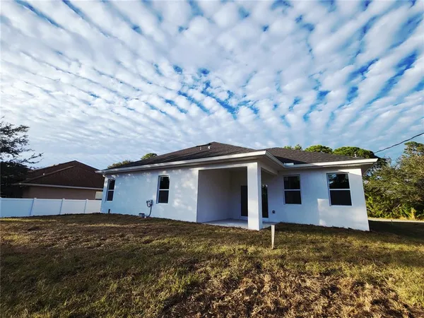 a front view of house with yard