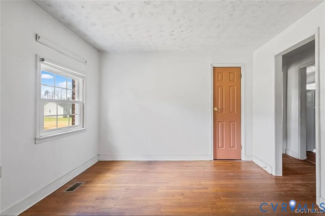 Dining room with light wood-style floors and a tex