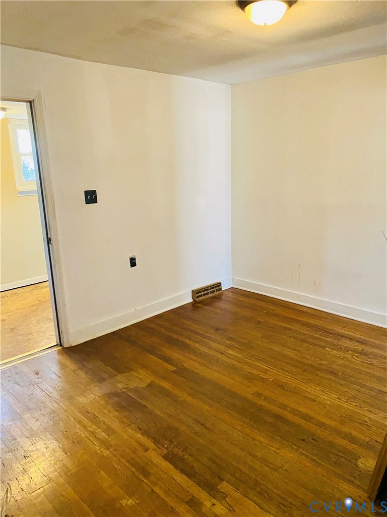906 Evans Road Powhatan, VA 23139 - Photo 10 of 18 Spare room with hardwood / wood-style floors and b