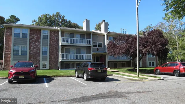 a car parked in front of a house