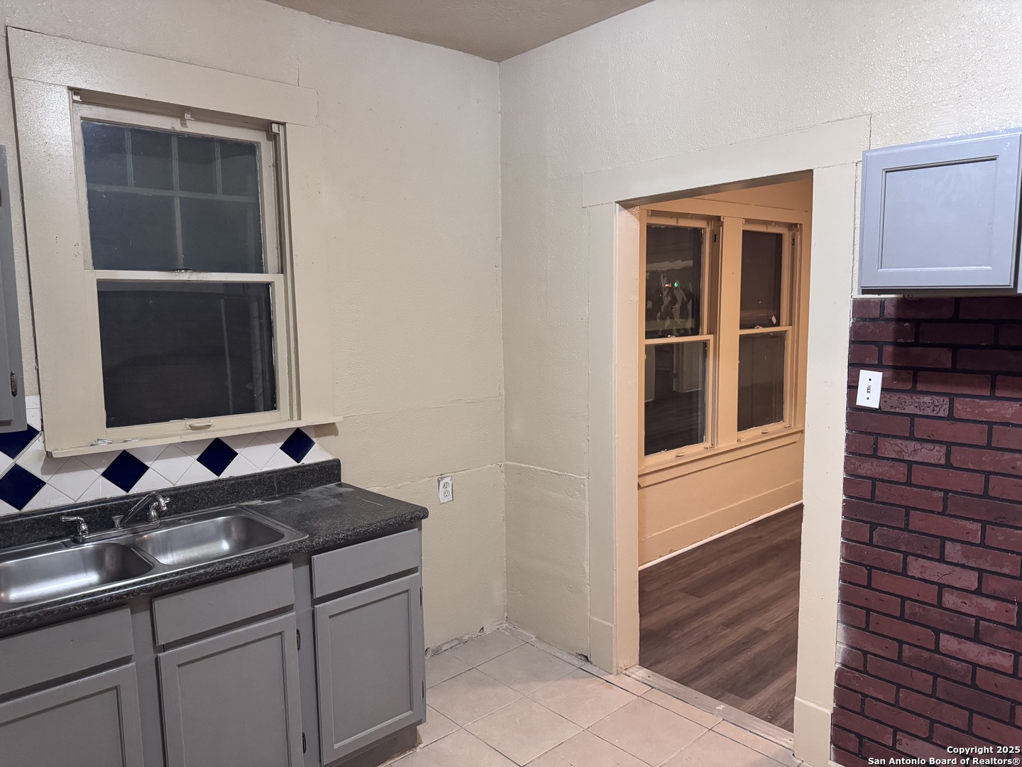 211 Blanco Road San Antonio, TX 78212 - Photo 19 of 34 a bathroom with a sink and a mirror