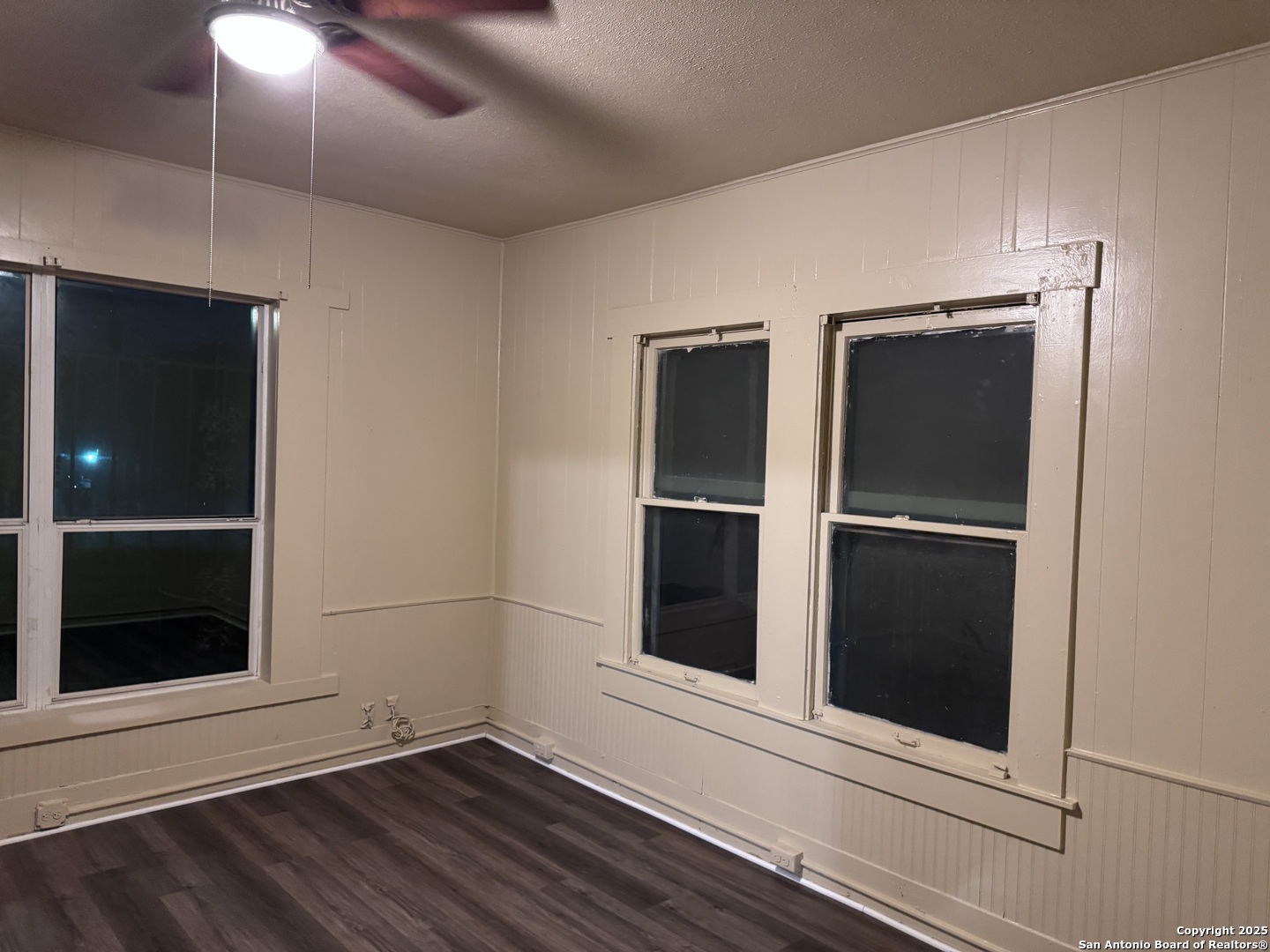 211 Blanco Road San Antonio, TX 78212 - Photo 7 of 34 a view of an empty room with wooden floor and closet