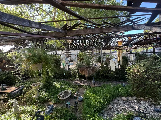 a view of a street with a parked cars