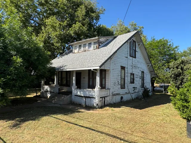 a view of a house with snow on the ground