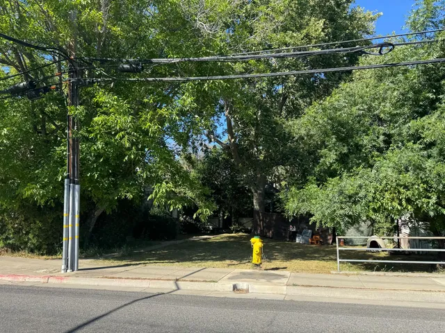 a view of a building along with trees