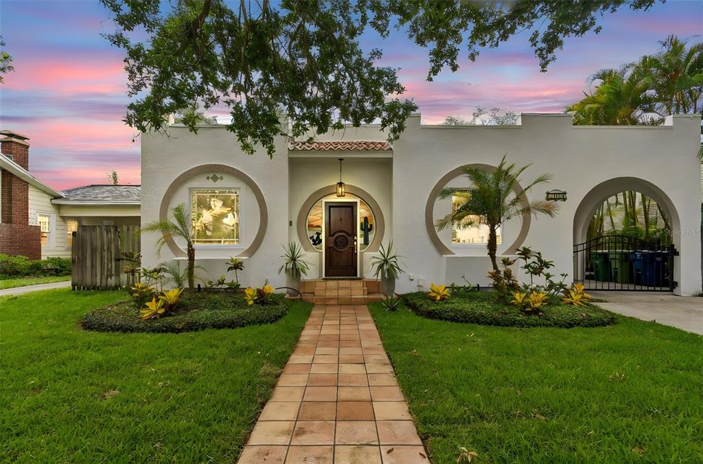 2434 West Prospect Road Tampa, FL 33629 - Photo 3 of 45 a front view of a house with garden