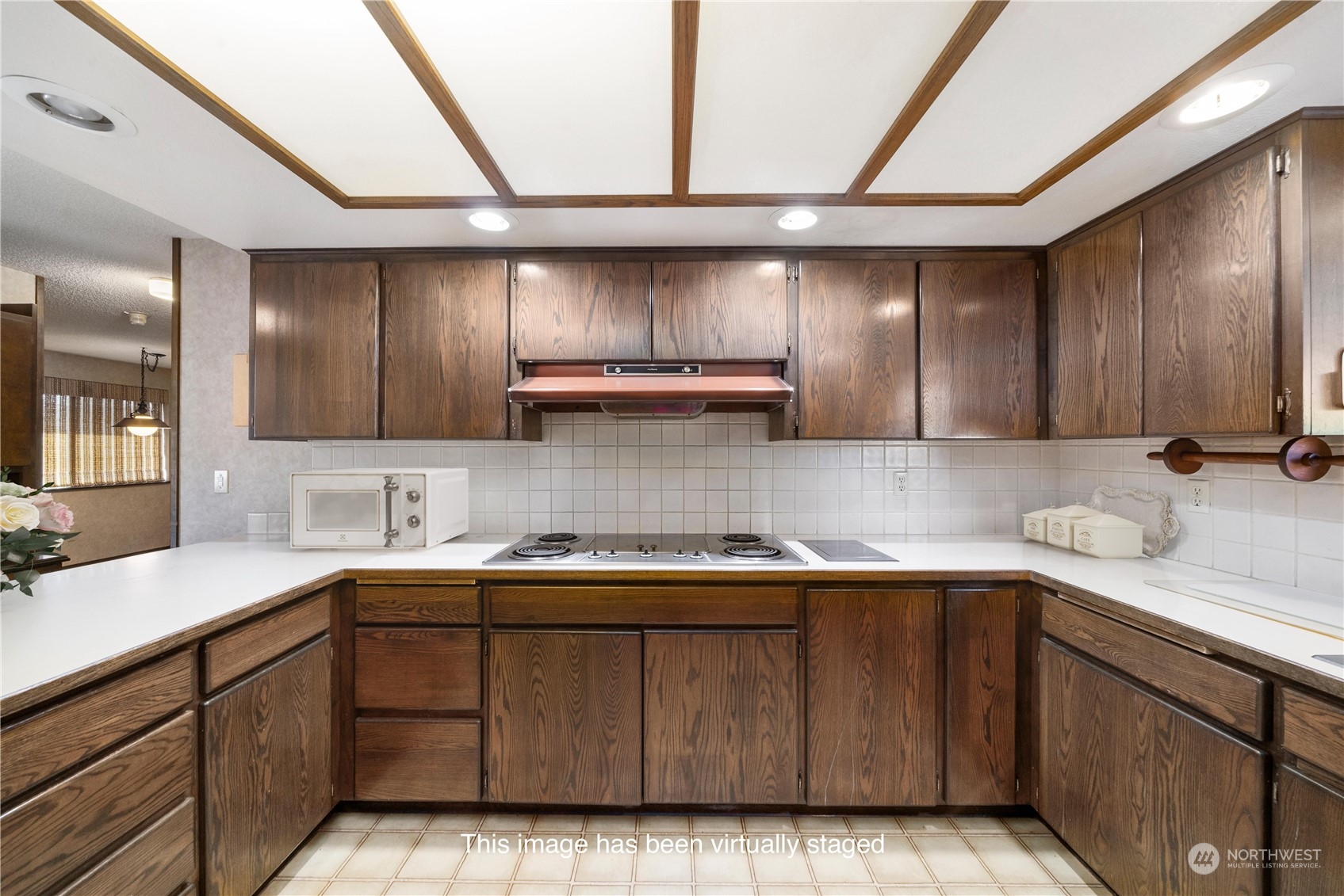 2435 McHugh Avenue Enumclaw, WA 98022 - Photo 12 of 35 a kitchen with a sink cabinets and window