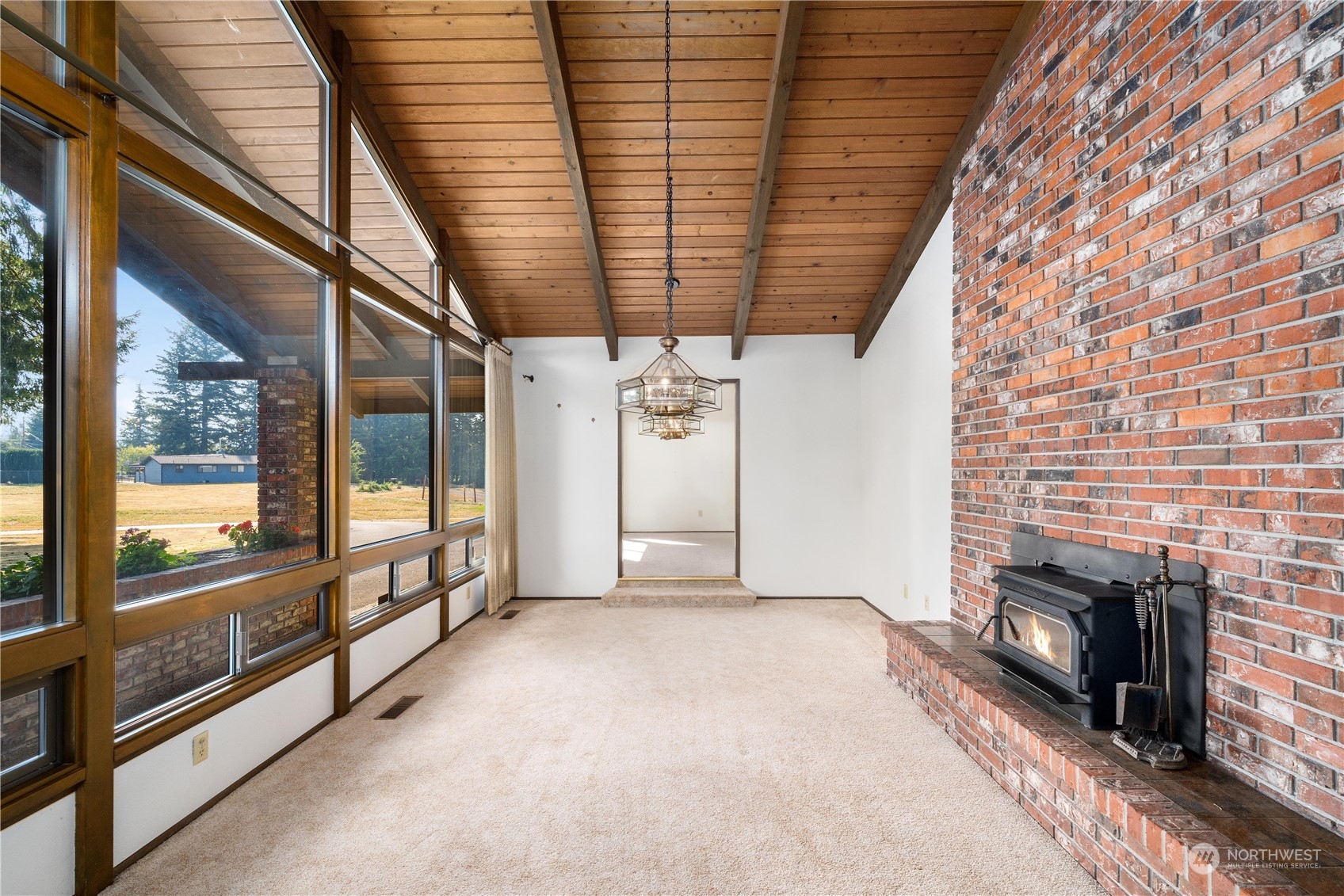 2435 McHugh Avenue Enumclaw, WA 98022 - Photo 15 of 35 a view of an empty room with a fireplace