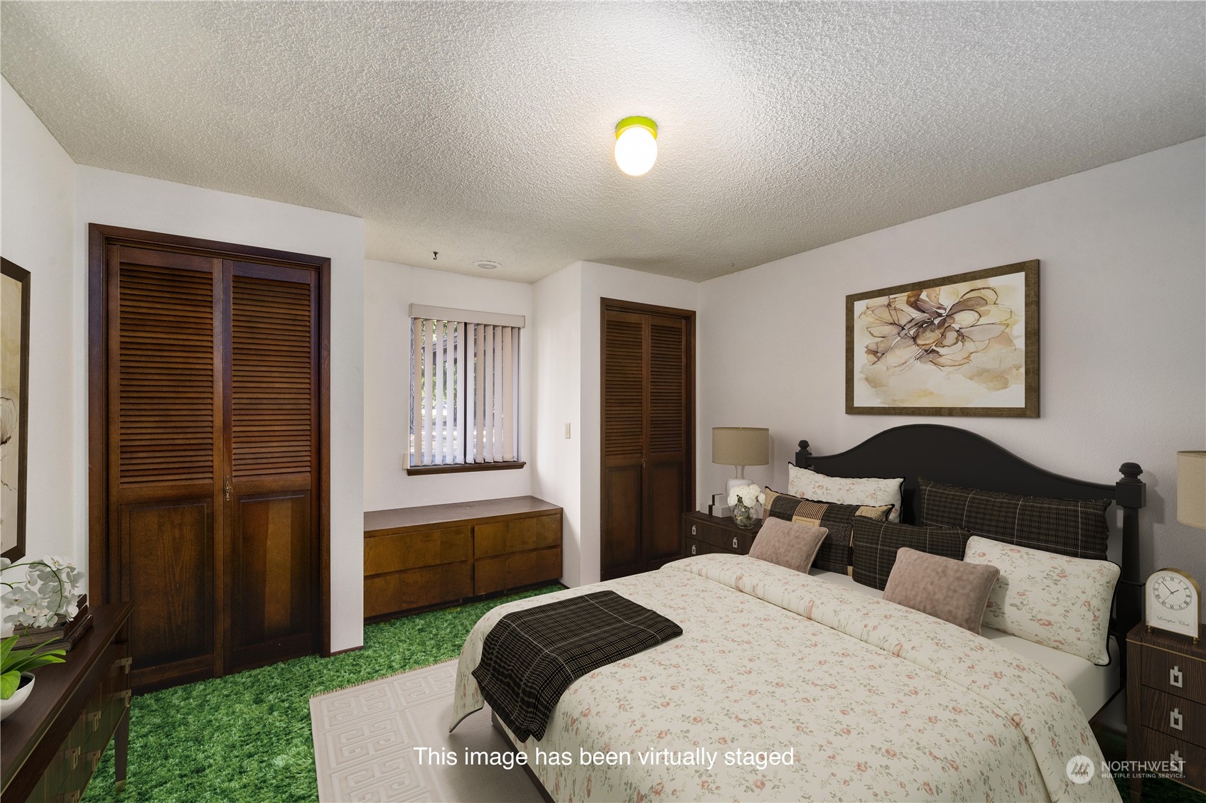 2435 McHugh Avenue Enumclaw, WA 98022 - Photo 22 of 35 a bedroom with bed and window