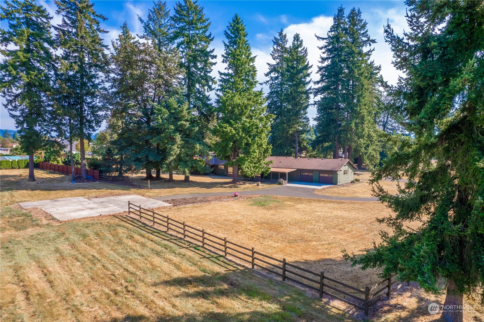 2435 McHugh Avenue Enumclaw, WA 98022 - Photo 34 of 35 a view of outdoor space with trees
