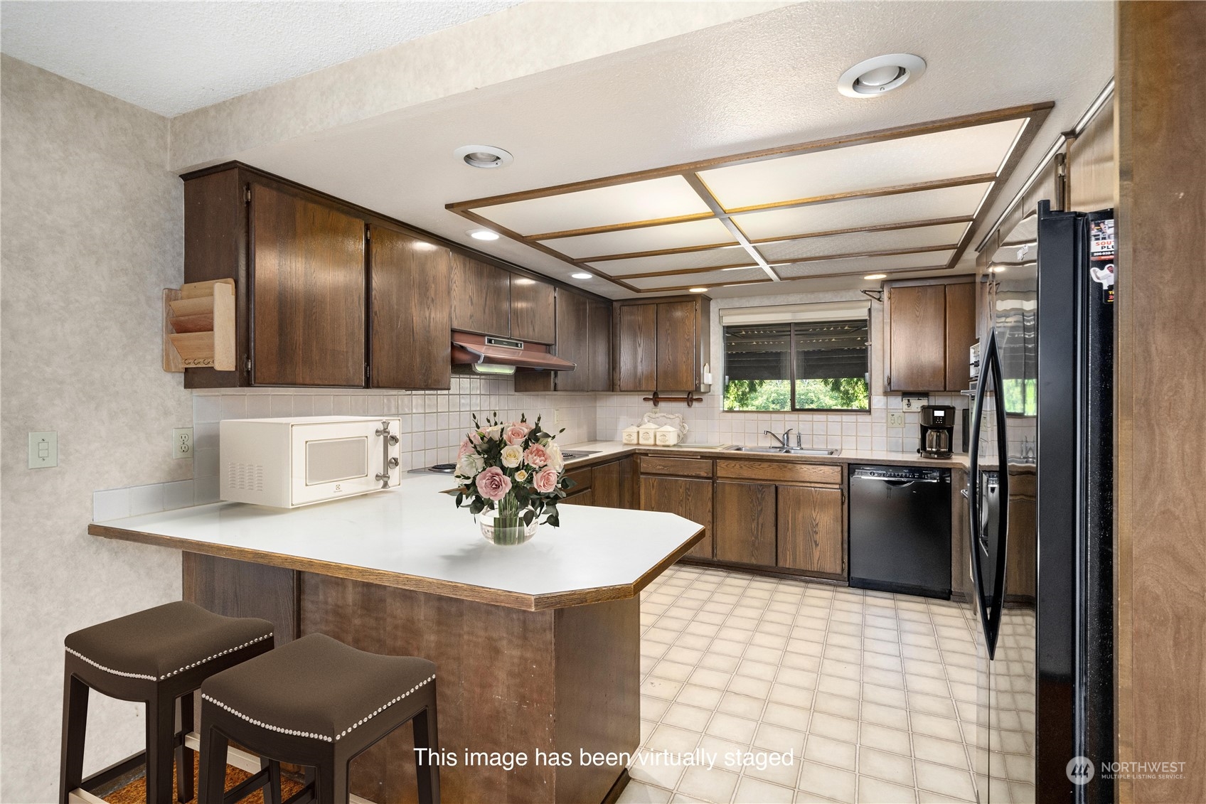 2435 McHugh Avenue Enumclaw, WA 98022 - Photo 10 of 35 a kitchen with a sink cabinets and appliances