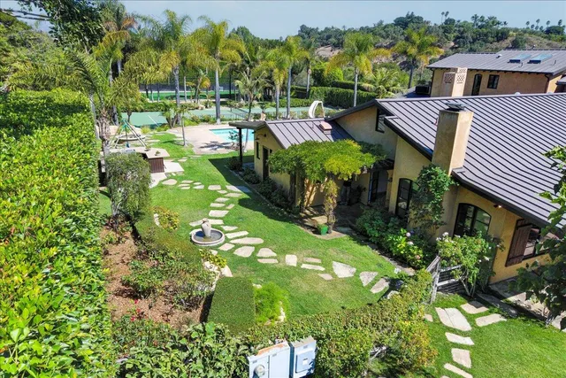 a backyard of a house with lots of green space