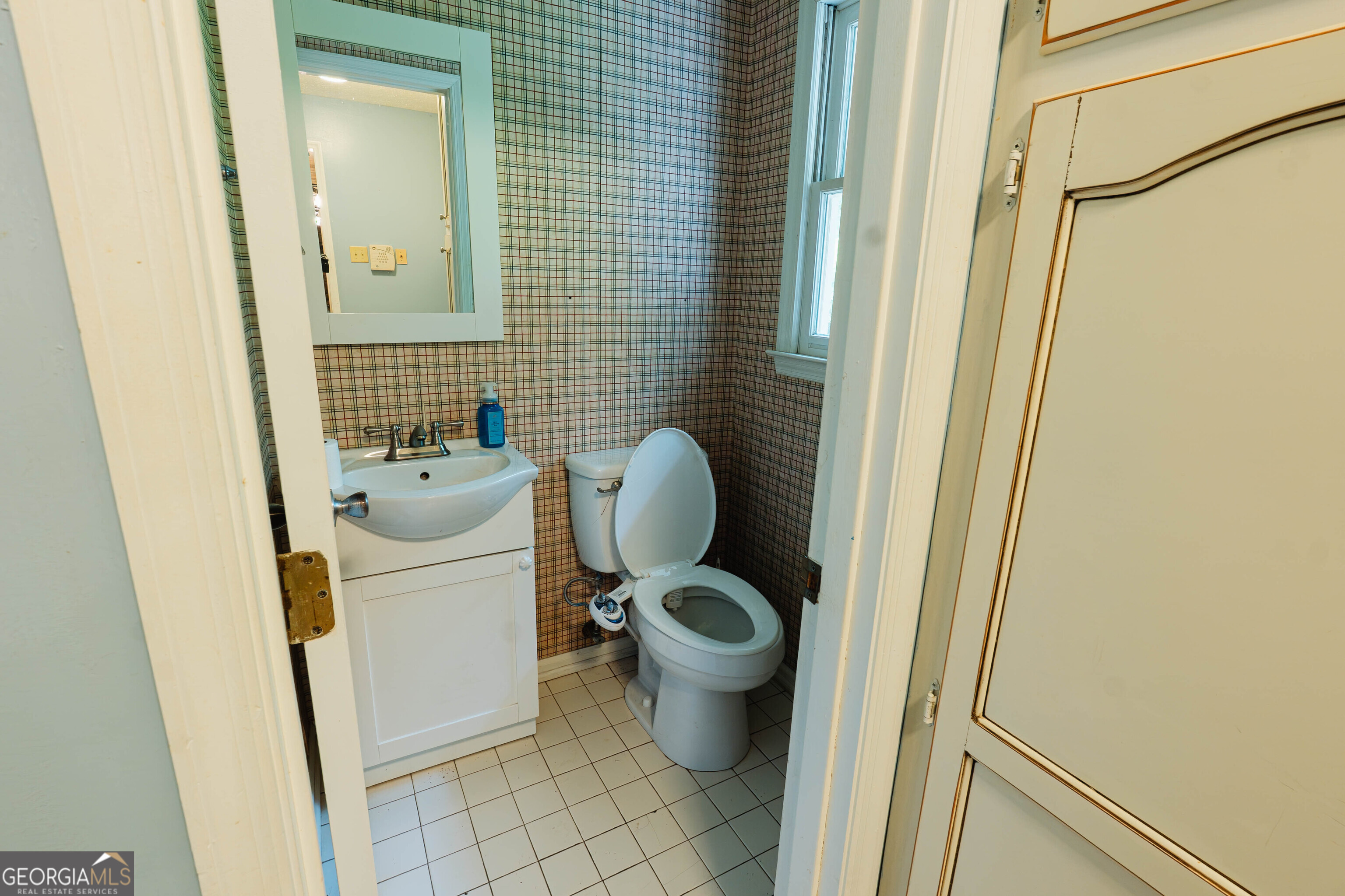 139 Cords Bridge Road Northeast Milledgeville, GA 31061 - Photo 7 of 35 a bathroom with a toilet and a sink