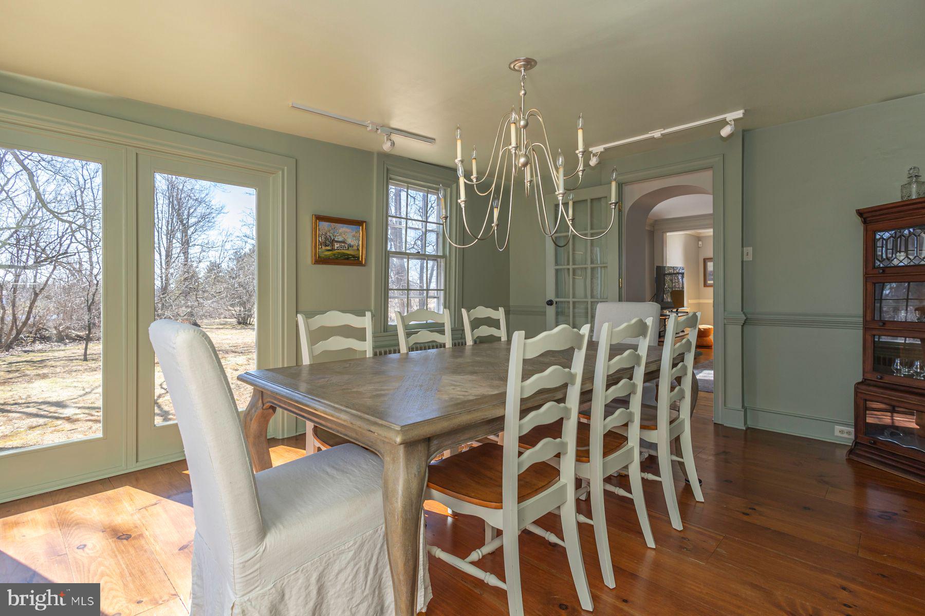 718 Telegraph Road Perkasie, PA 18944 - Photo 12 of 47 a view of a dining room with furniture window and wooden floor
