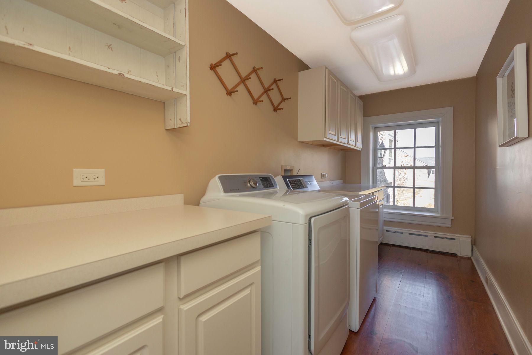 718 Telegraph Road Perkasie, PA 18944 - Photo 20 of 47 a utility room with dryer and washer