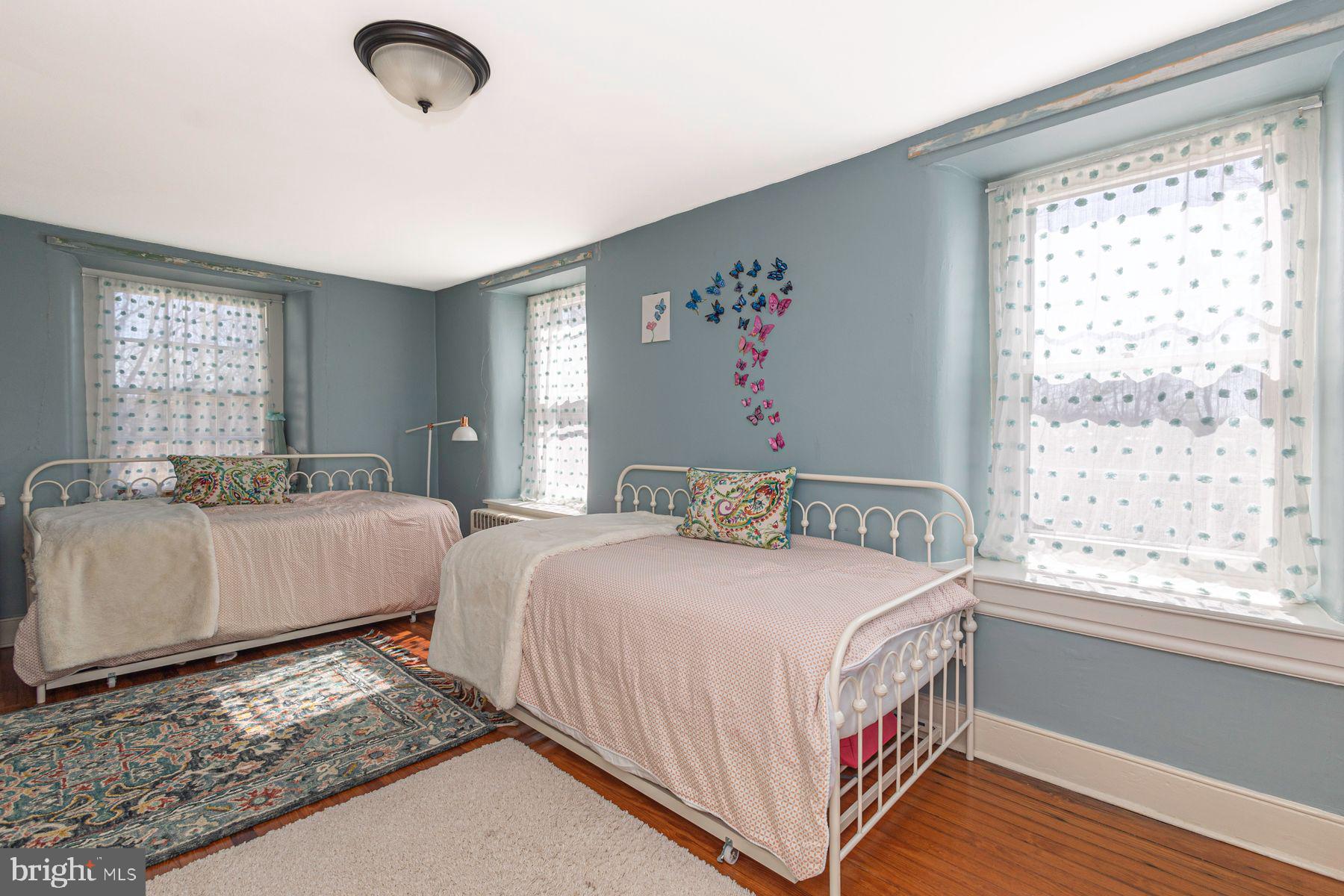 718 Telegraph Road Perkasie, PA 18944 - Photo 25 of 47 a bedroom with a bed and a large window