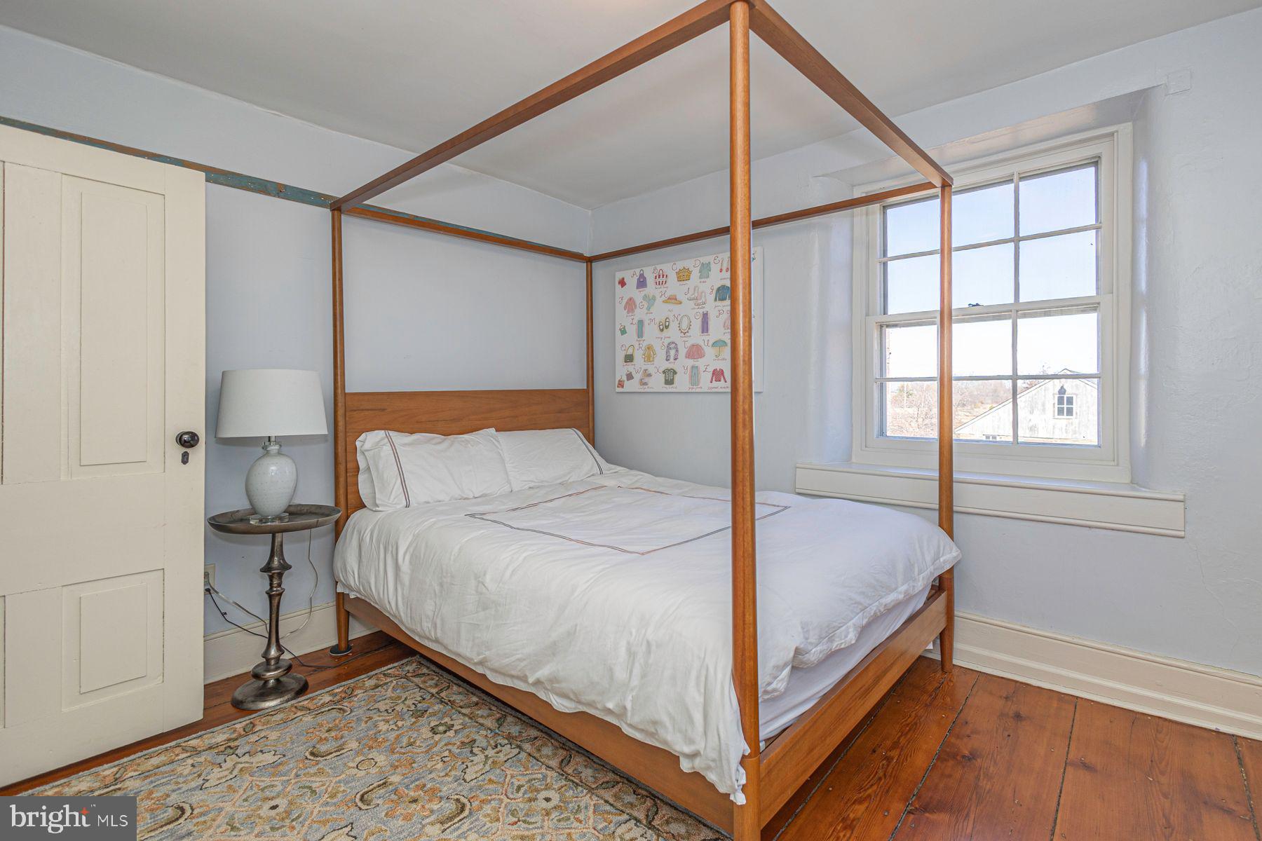 718 Telegraph Road Perkasie, PA 18944 - Photo 28 of 47 a bedroom with a bed and a window