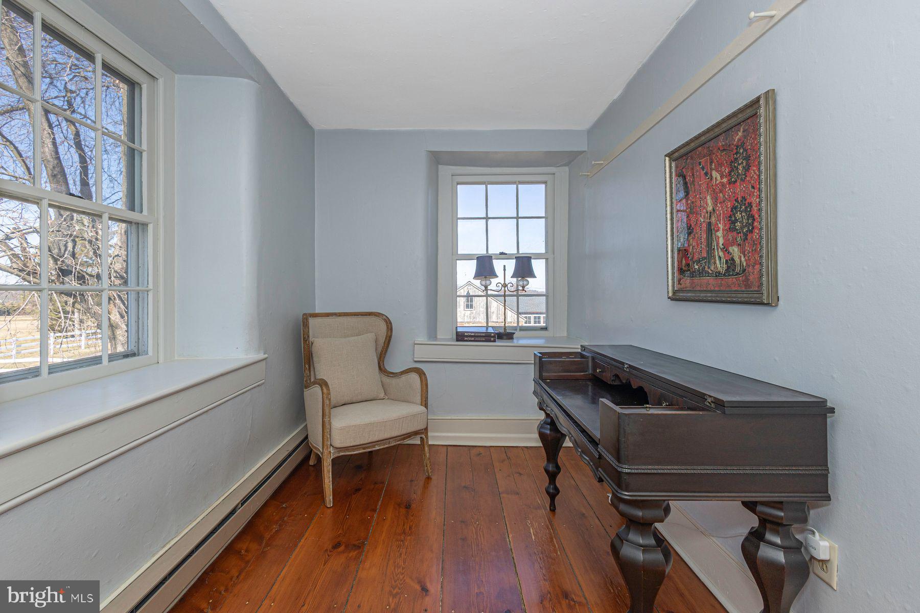 718 Telegraph Road Perkasie, PA 18944 - Photo 29 of 47 a living room with furniture and a window