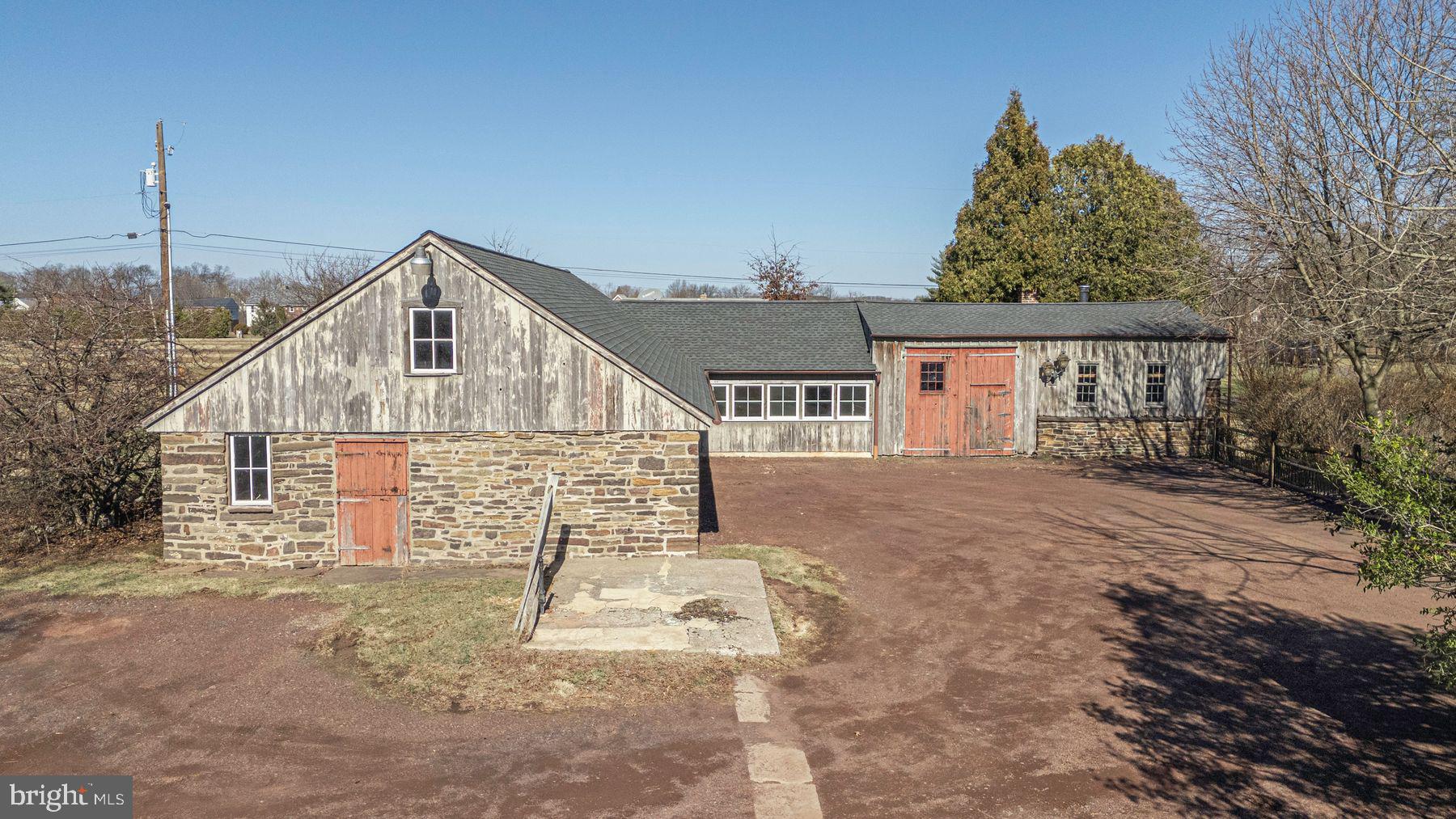 718 Telegraph Road Perkasie, PA 18944 - Photo 32 of 47 a view of a house with a yard
