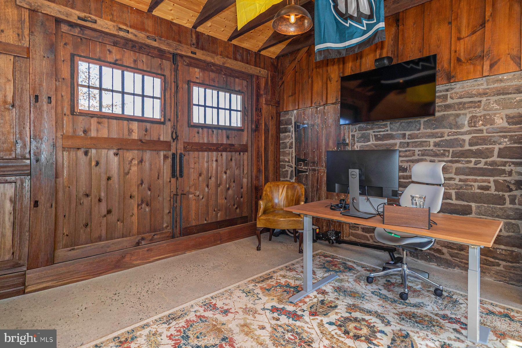 718 Telegraph Road Perkasie, PA 18944 - Photo 36 of 47 a outdoor living space with furniture and a flat screen tv